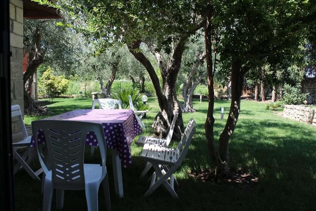 Appartamento Le Tre Palme Frigintini Habitación foto